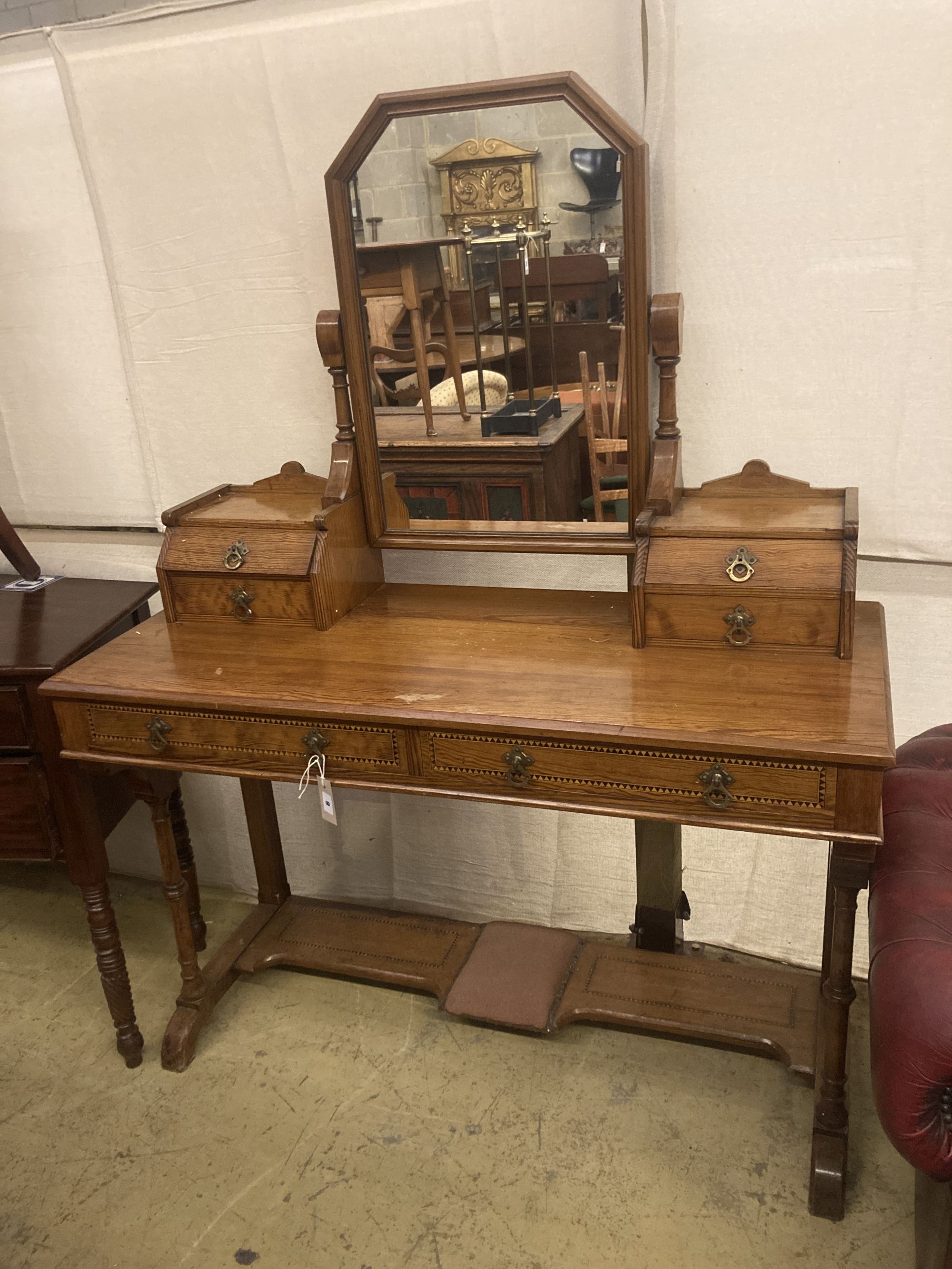 A Victorian Aesthetic movement pitch pine dressing table, width 122cm depth 52cm height 160cm